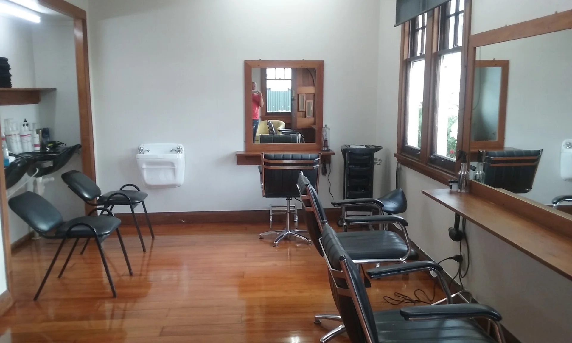 Salon interior with basins and styling stations