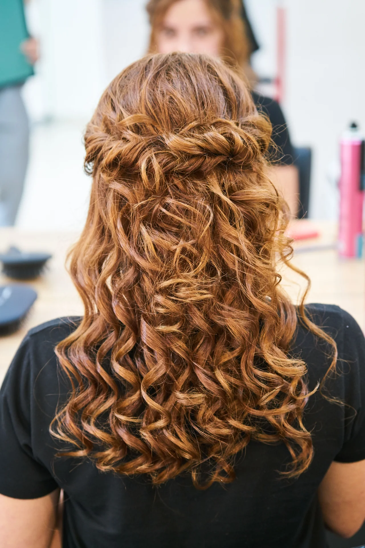 An elegant curled hairstyle from behind